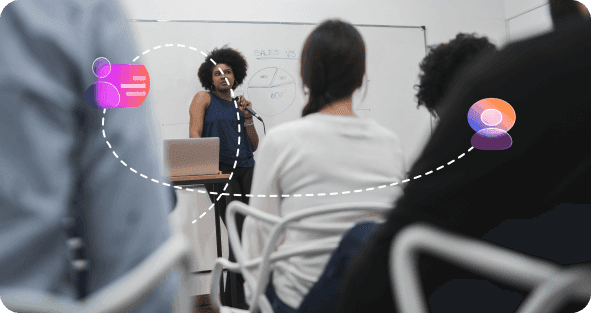 A trainer presenting to a small team in an SME
